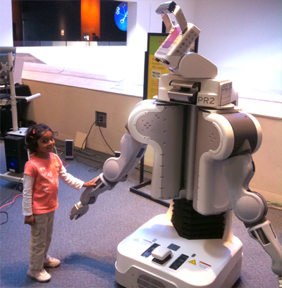 Small girl with
robot